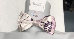 purple and white bowtie